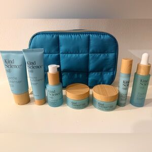 New Unused Kind Science by Ellen Degeneres Skincare Set with Blue and Tan Bag
